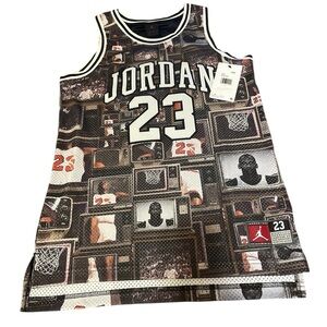 Jordan Big Kids' 23 Jersey in a black "all-over icon print".